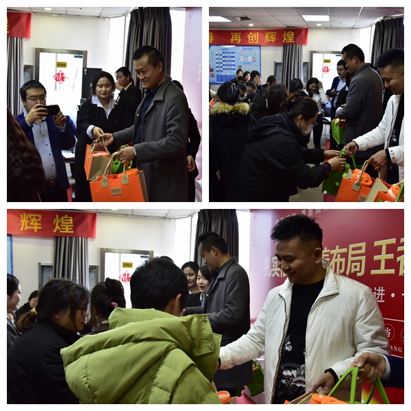 易視界陳總和陶總為員工發放女神節禮物